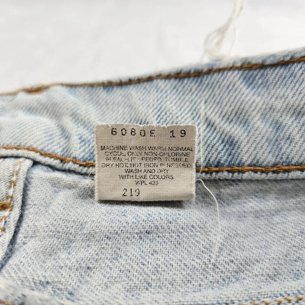 Vtg Levi's 560 Orange Tab Jeans 34x29 90s USA Loose Tapered Light Wash Raw Hem